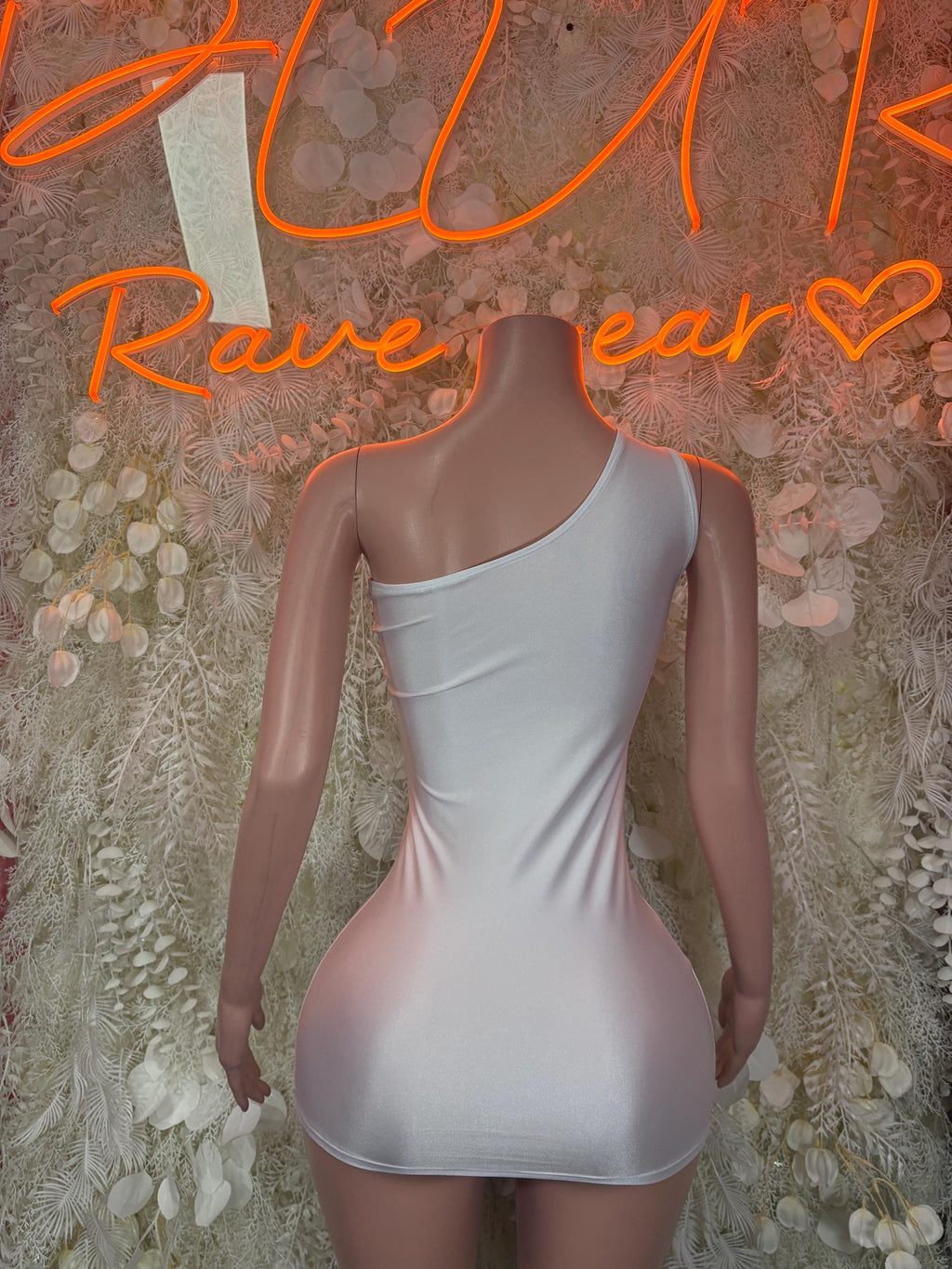 White sleeveless mini dress with low-back cutout and halter straps