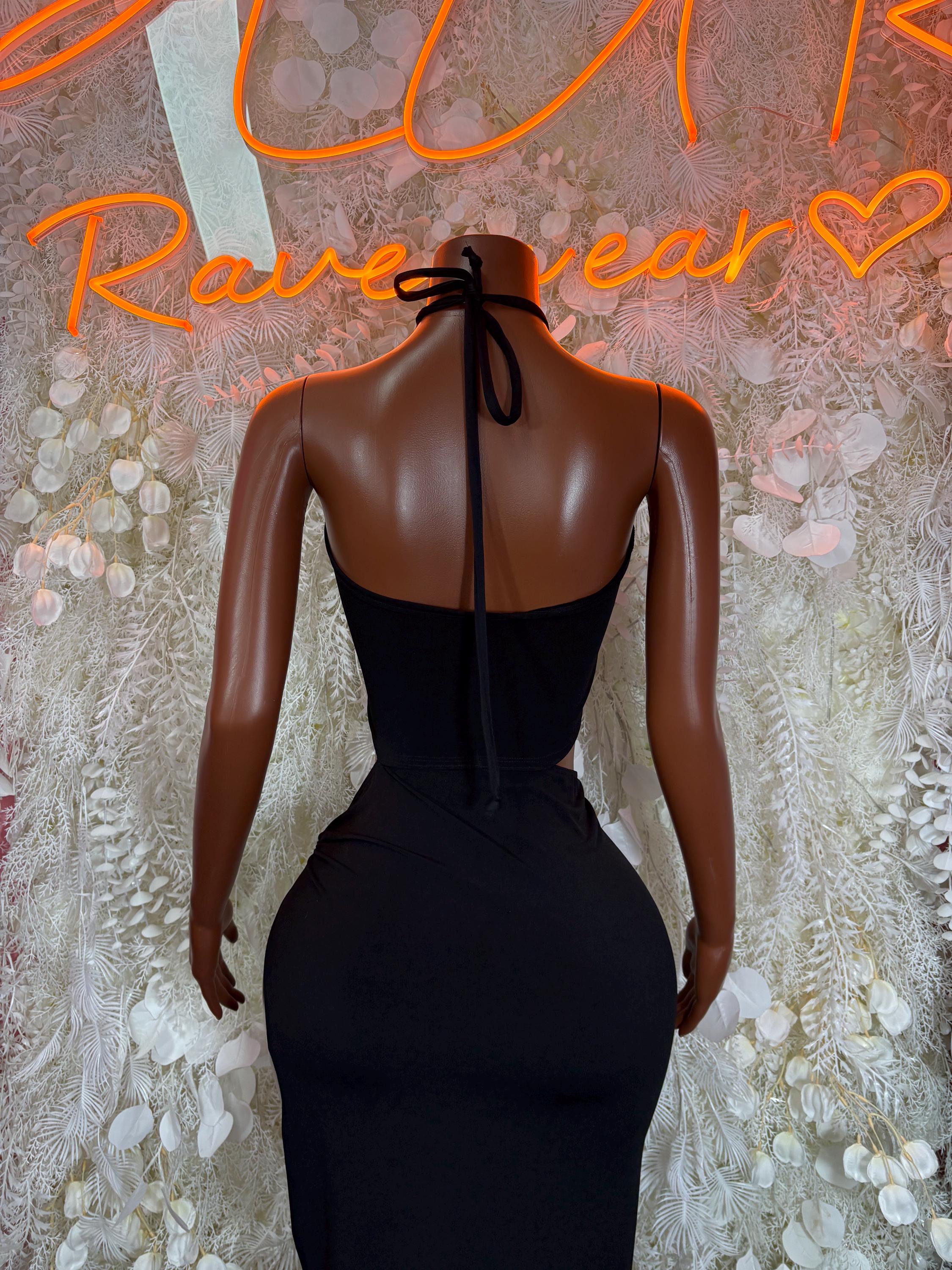 Black backless halter mini dress with tied neck and open back