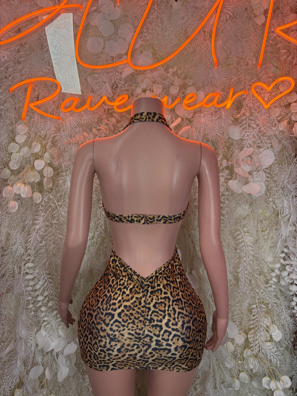Leopard print halter dress with open back and low back cutout