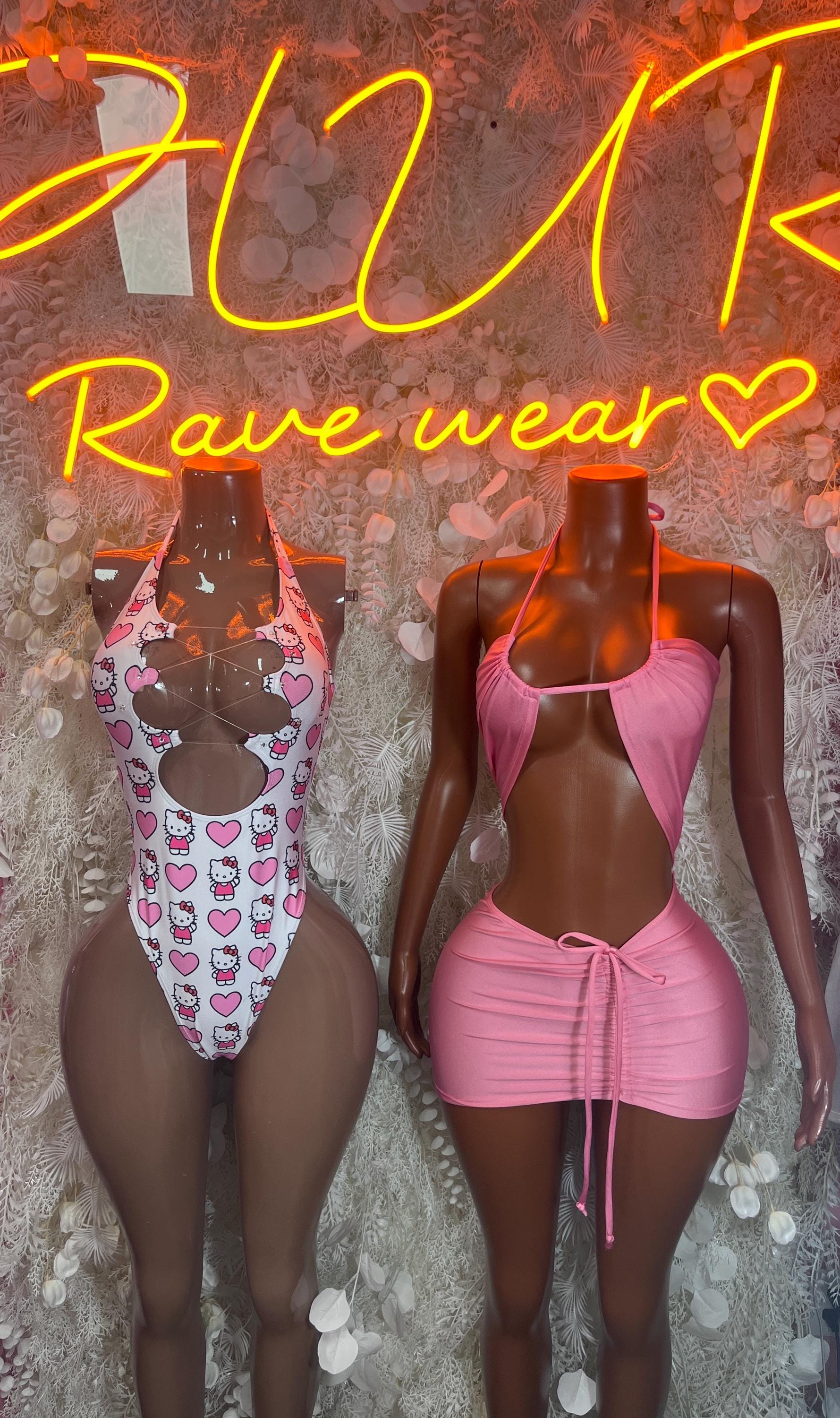 Heart-print and pink halter mini dresses, one-piece style with back ties