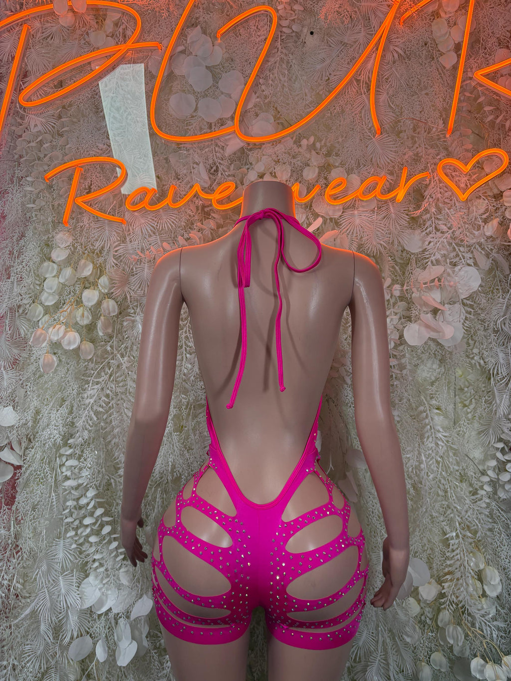Pink rhinestone cutout bodysuit with open-back straps and adjustable tie strings
