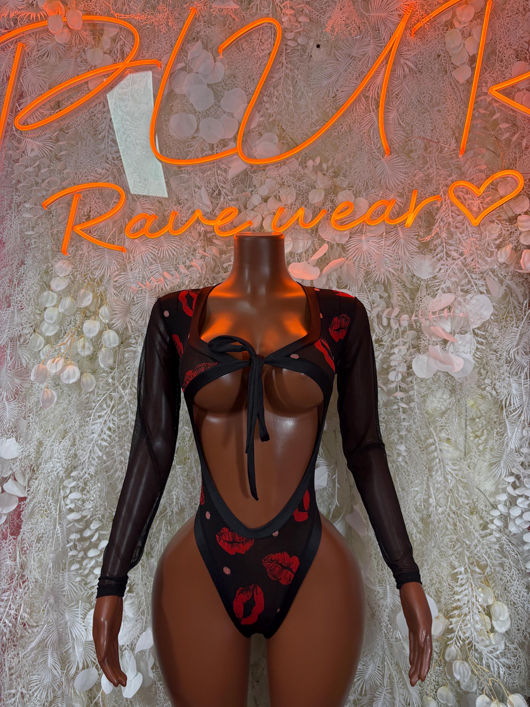 Black sheer long-sleeve bodysuit with red heart print and front cutout with tie