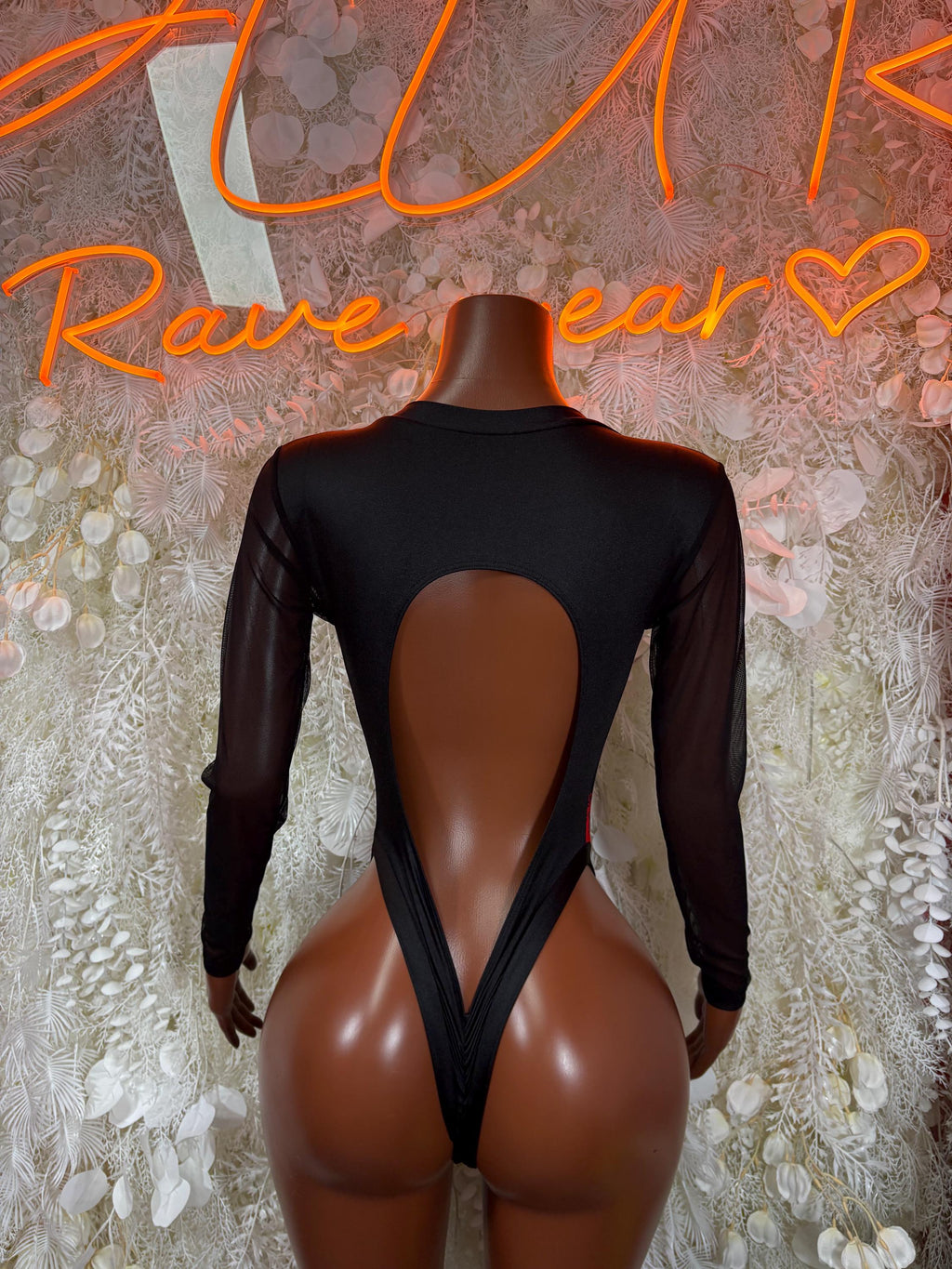 Black sheer long-sleeve bodysuit with open back teardrop cutout
