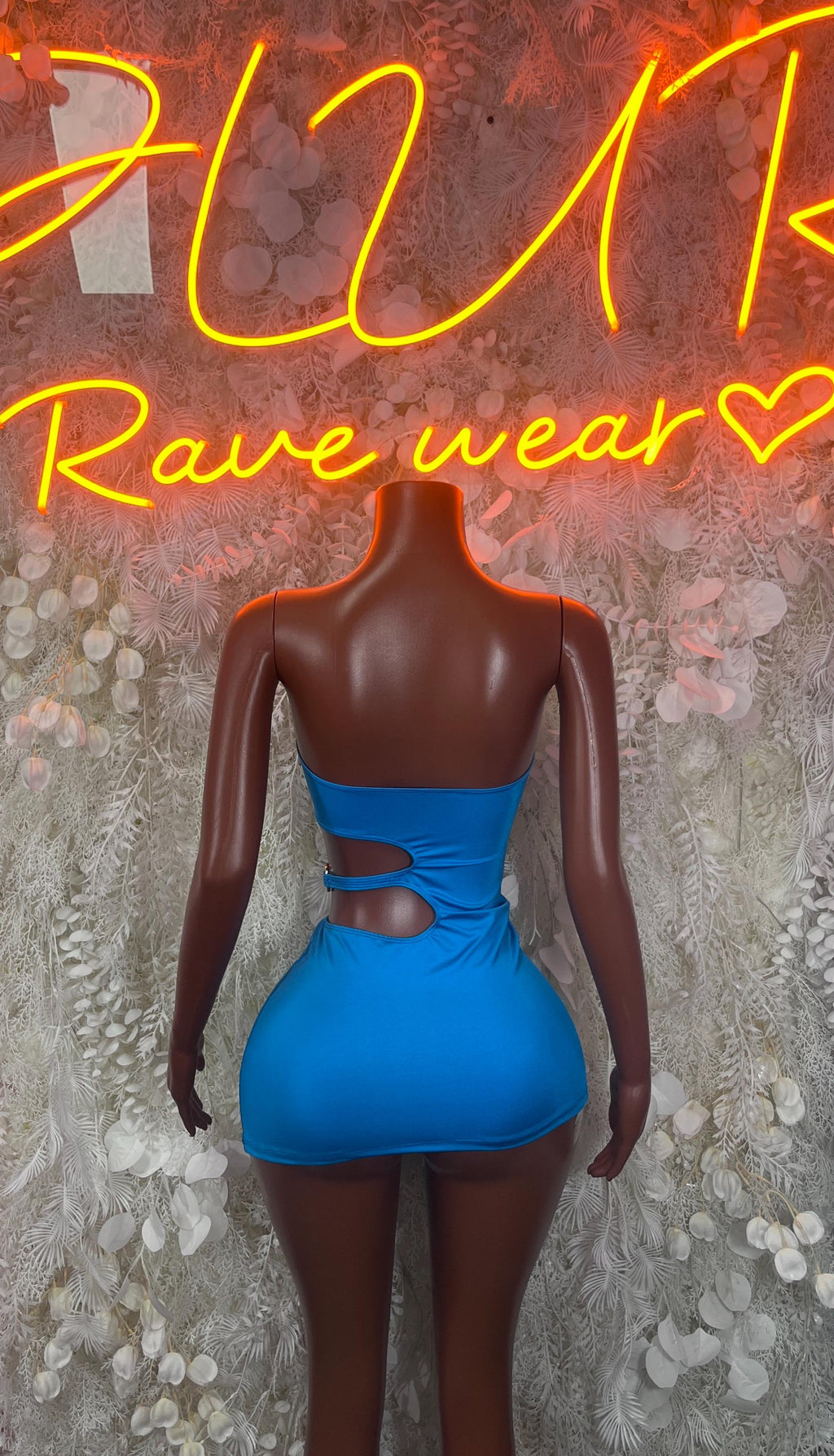 Blue mini club dress with strapless neckline and oval side cutout