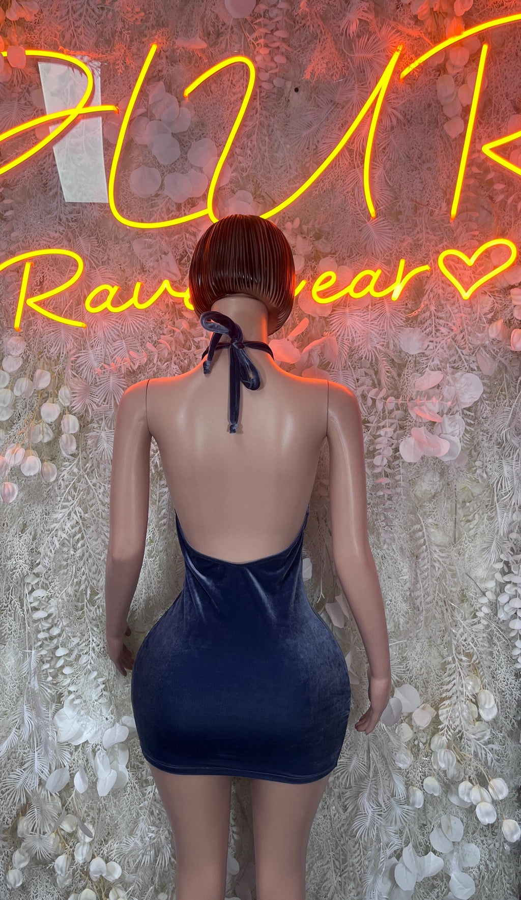 Blue velvet mini dress with open back, halter tie straps, fitted bodycon