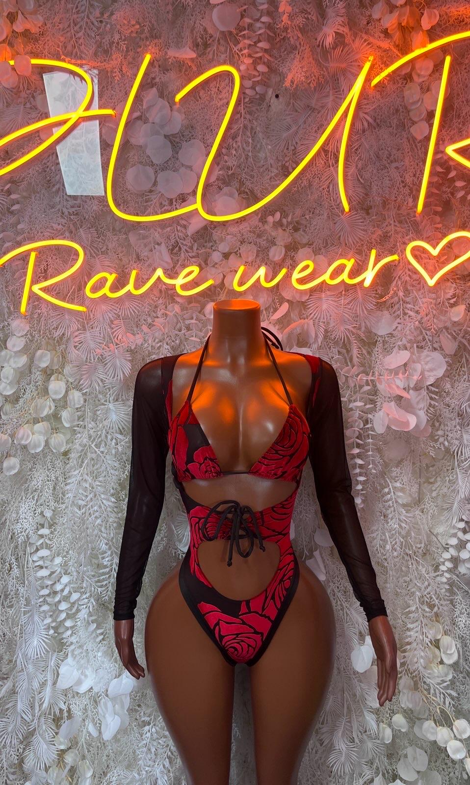 Red lace sweetheart thong bodysuit with sheer black long sleeves and tie back