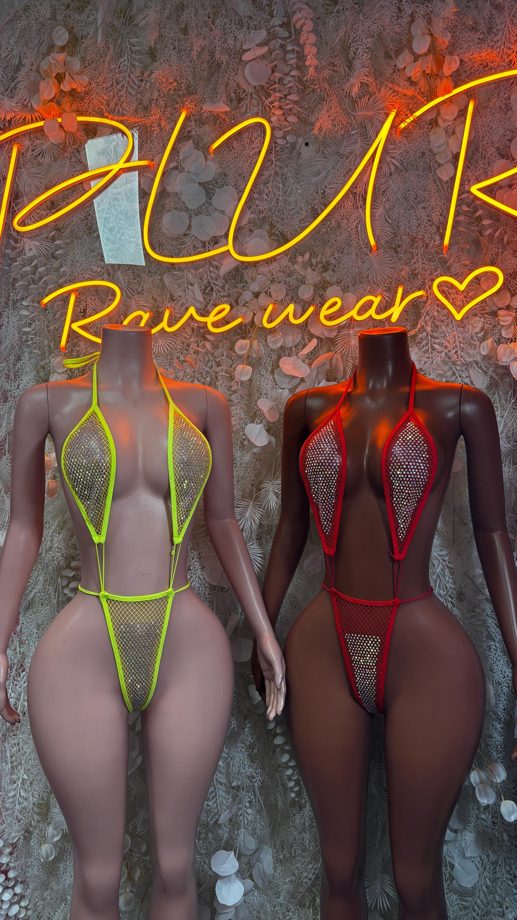 Neon yellow and red fishnet one-piece bodysuits with open backs