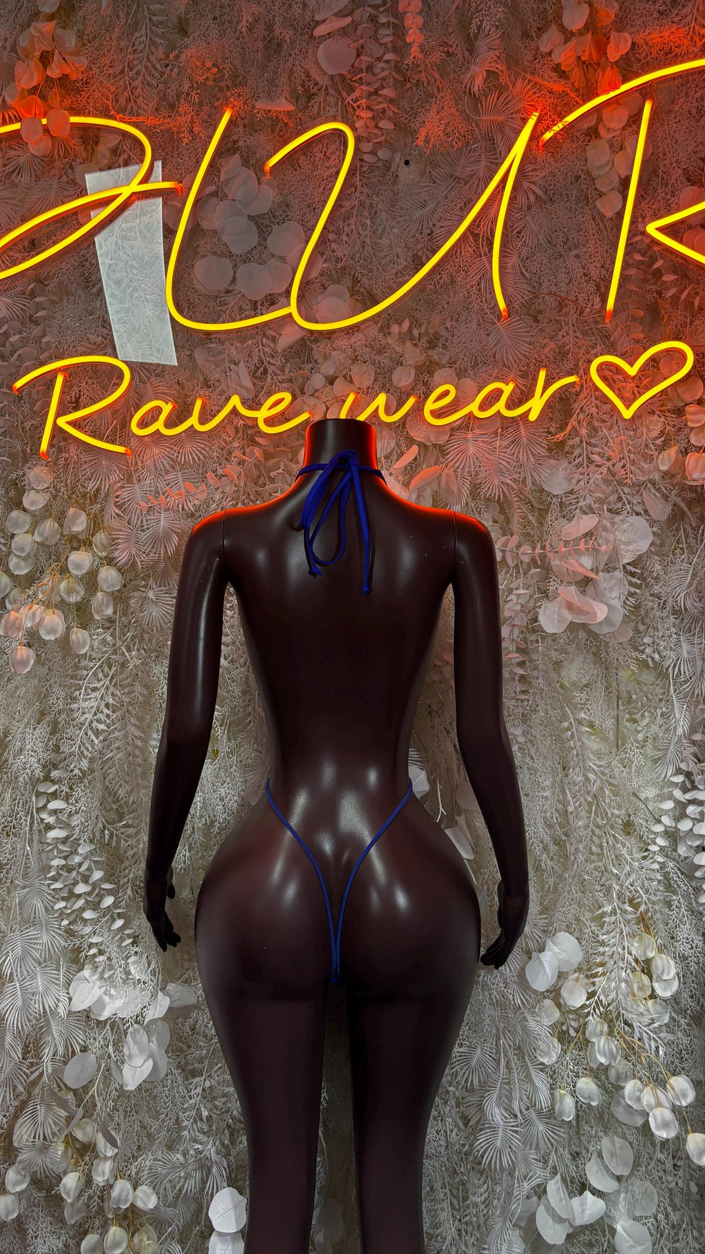 Fishnet rhinestone one-piece with blue back straps, back view, long sleeves