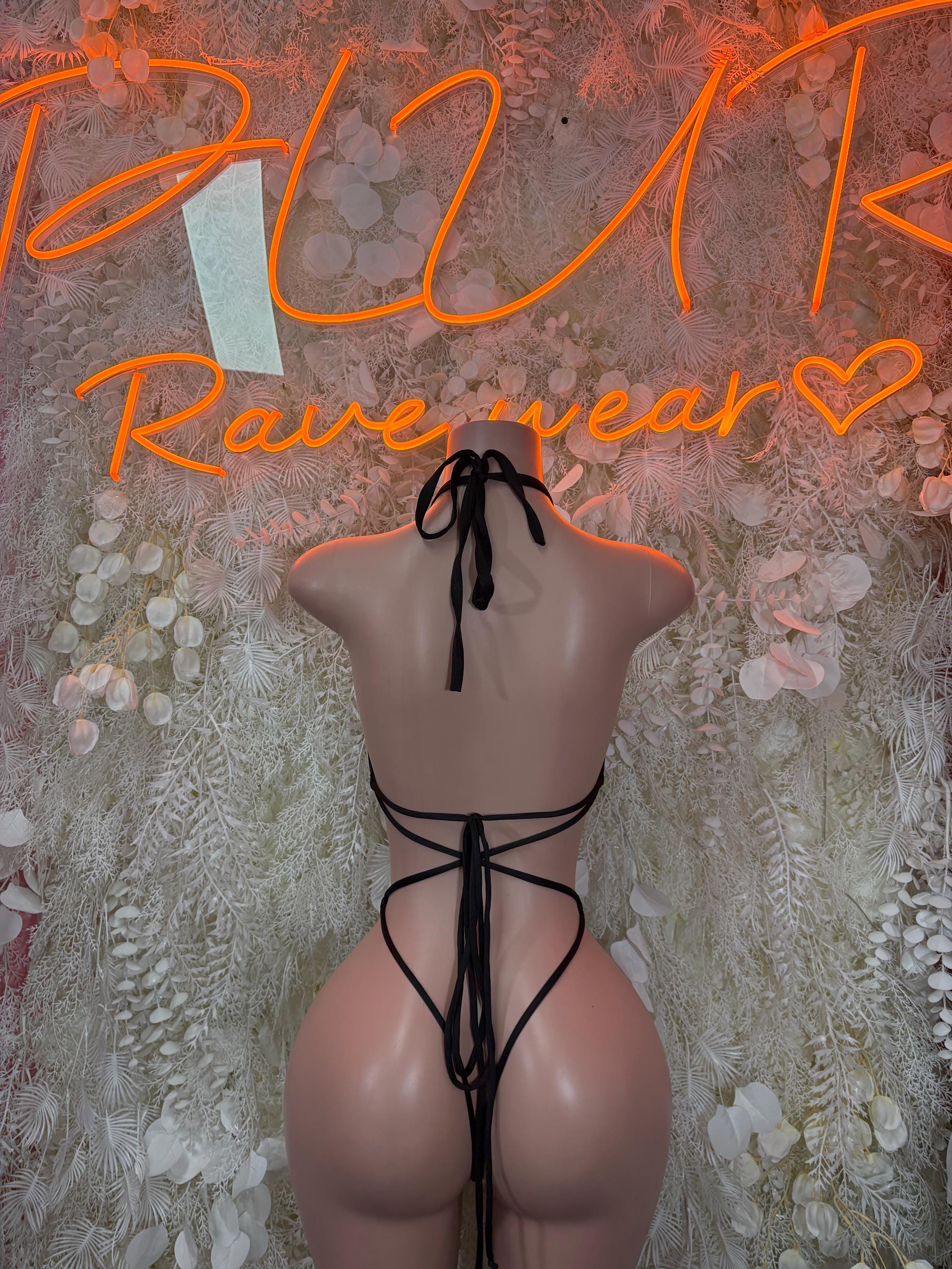 Black fishnet bodysuit back with tie straps and cutout panel
