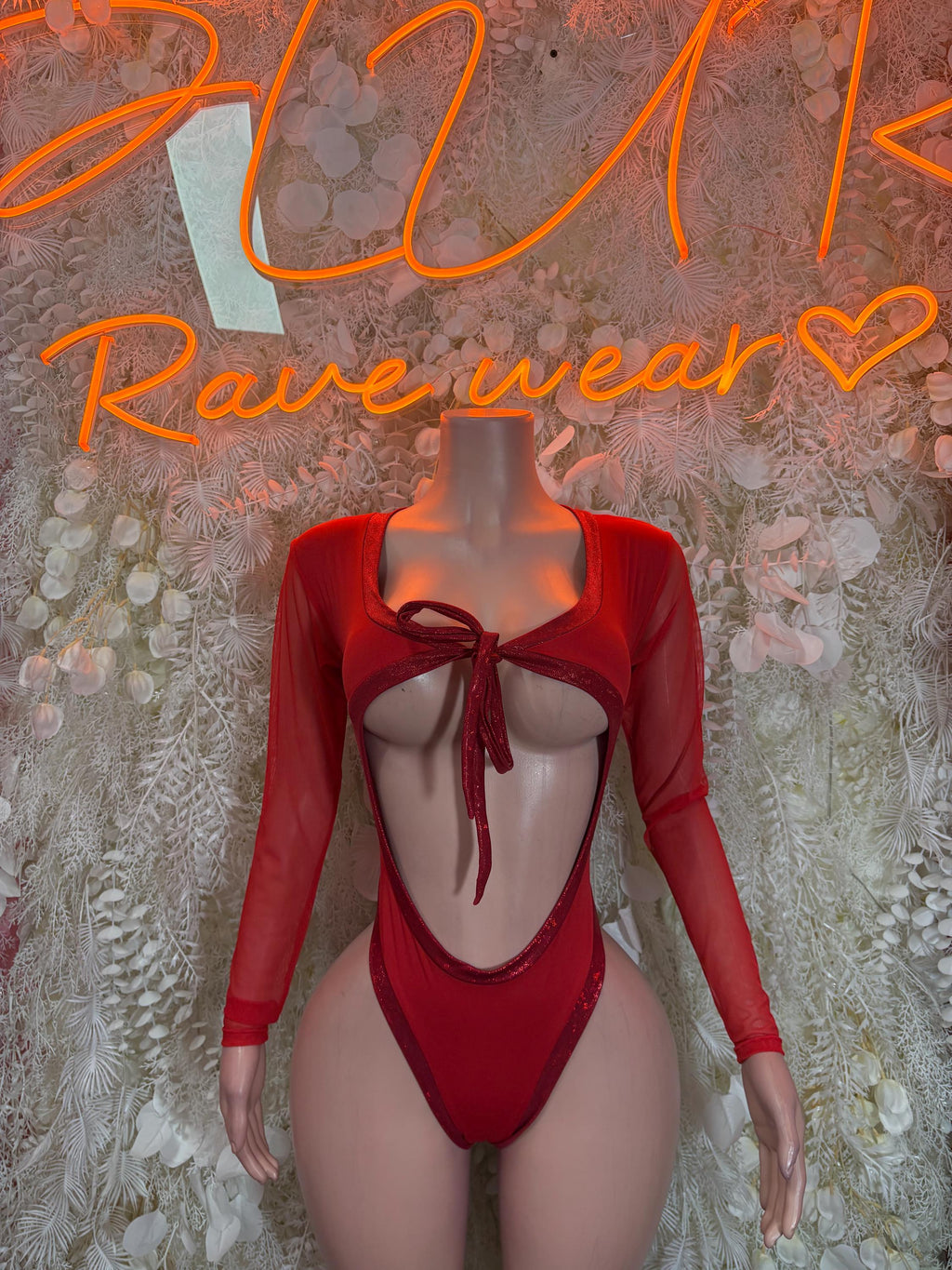 Red long-sleeve bodysuit with tie-front neckline and high-cut thong back