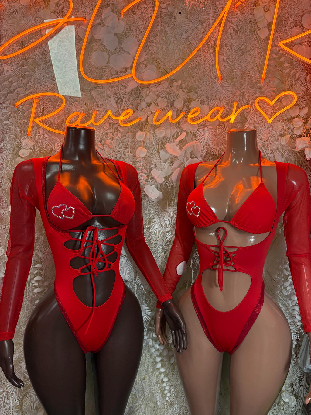 Red heart bodysuit with long sleeves, lace-up chest and matching cutout sides