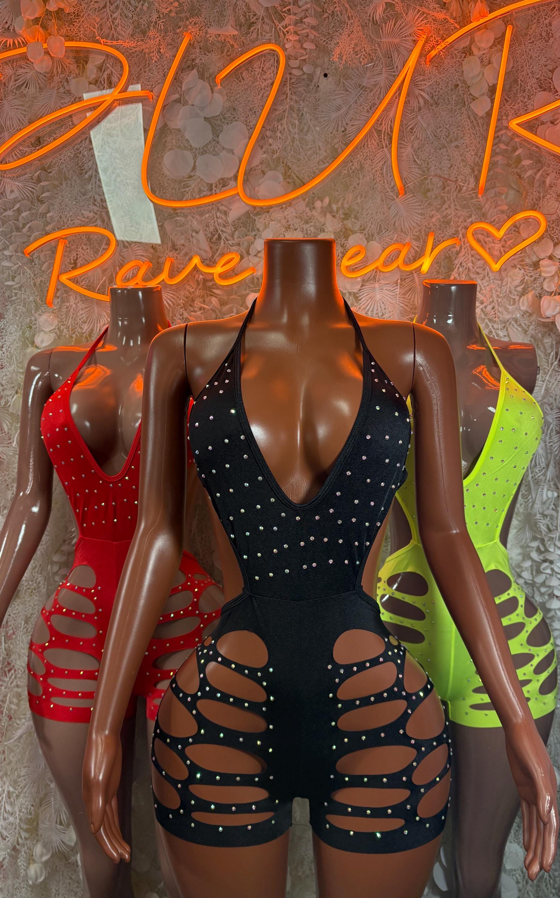 Neon cutout bodysuit on three mannequins: red, black, and green V-neck styles