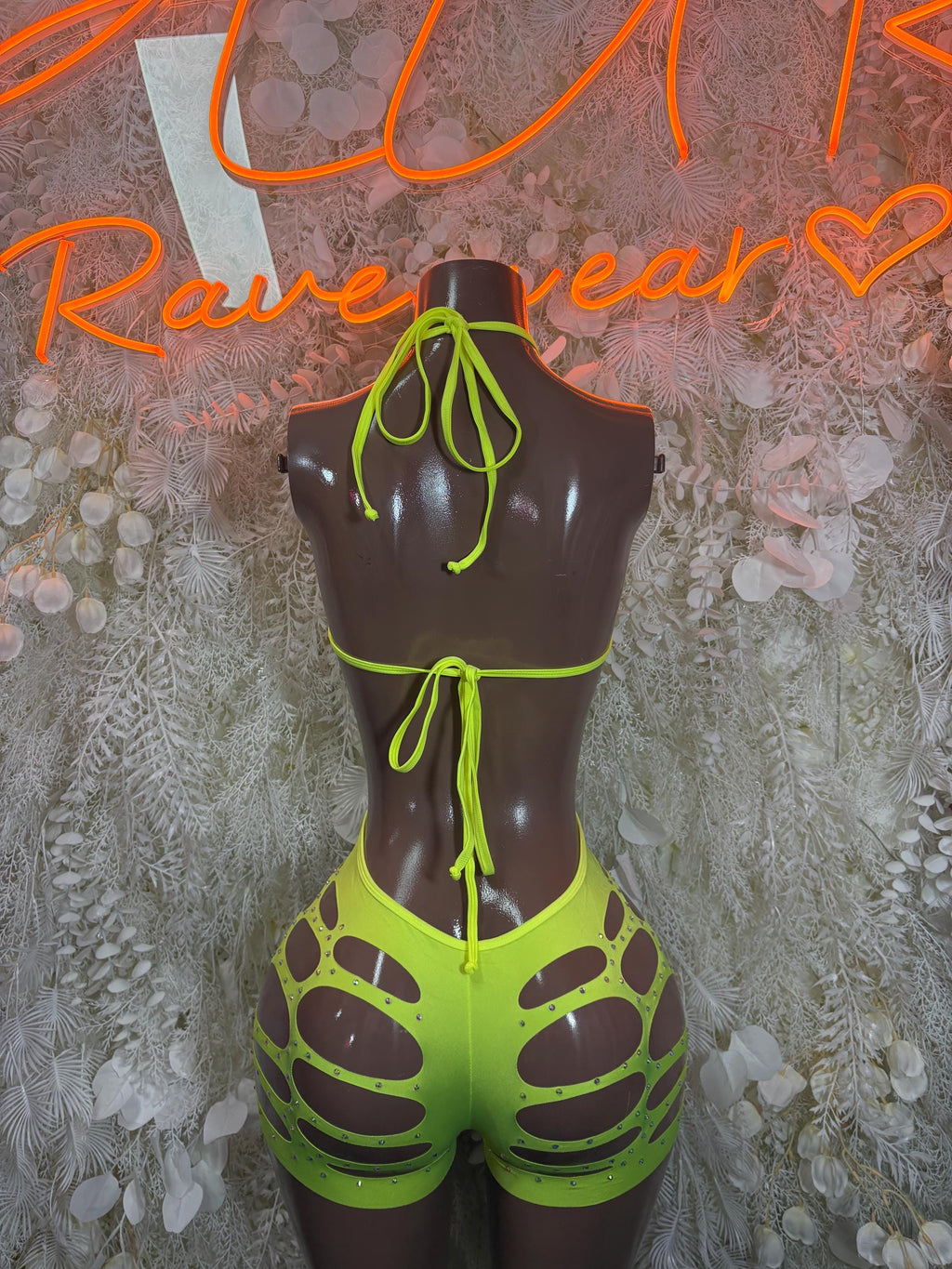 Neon green cutout bodysuit with back tie straps and openwork lower sides