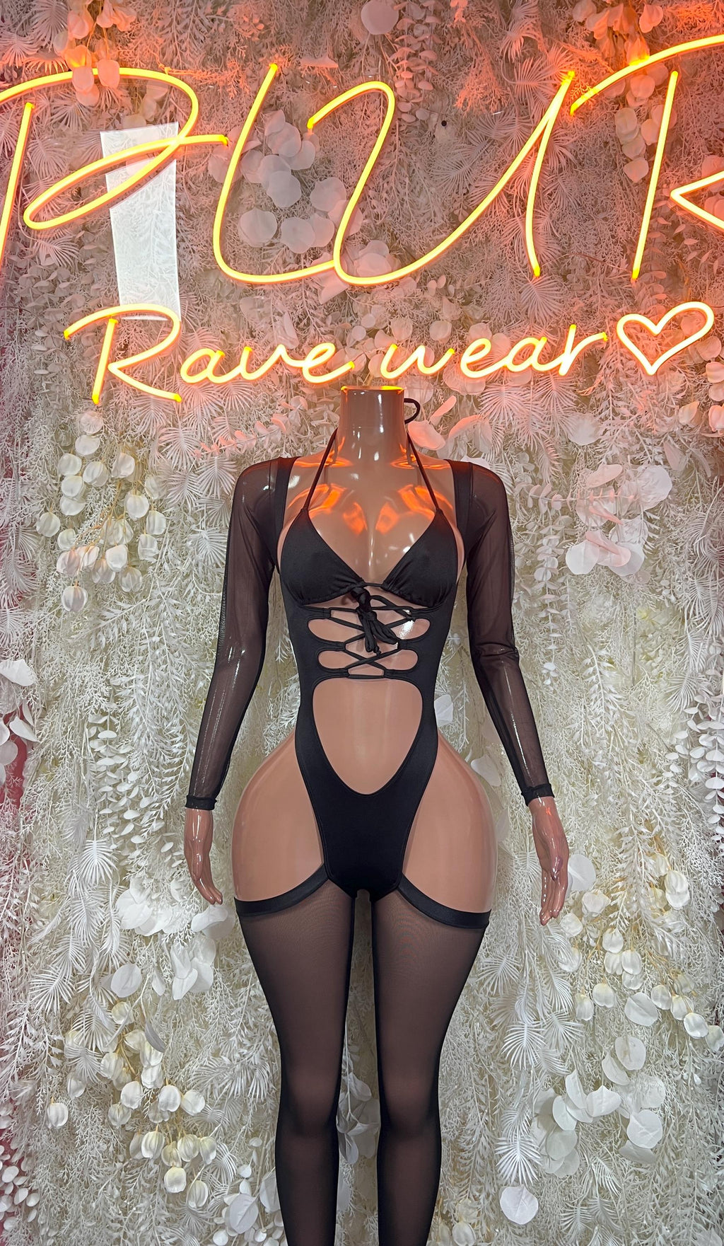Black long-sleeve bodysuit with lace-up front, sheer panels, high-cut legs