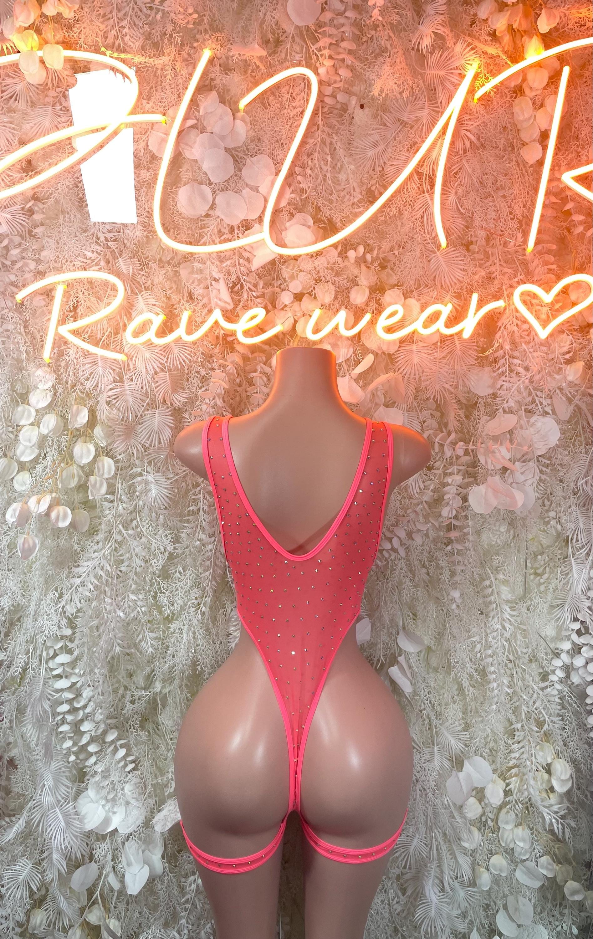 Pink rhinestone backless bodysuit with U-shaped back and high-cut leg straps