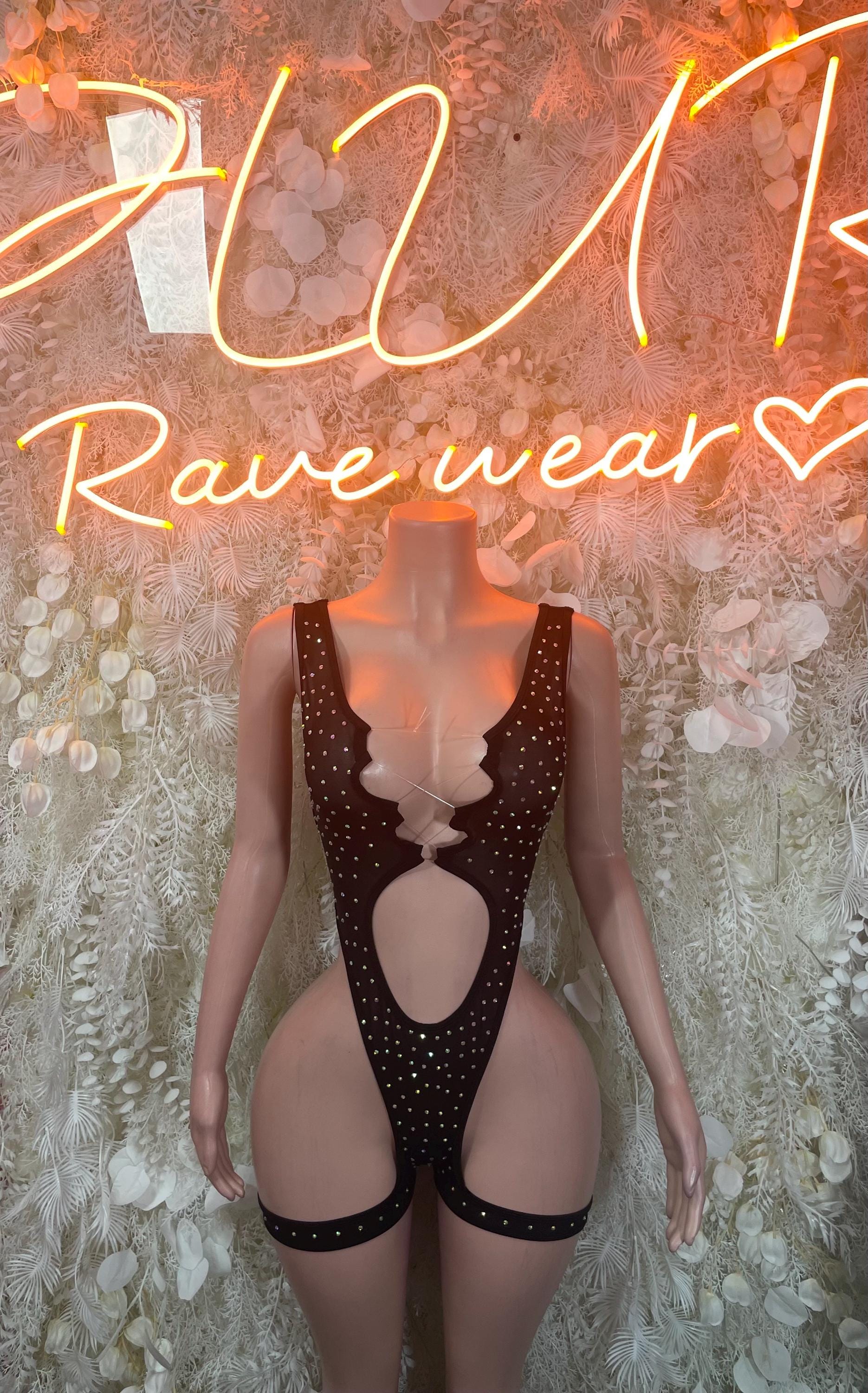 Black rhinestone bodysuit with deep V neckline and high-cut thigh straps