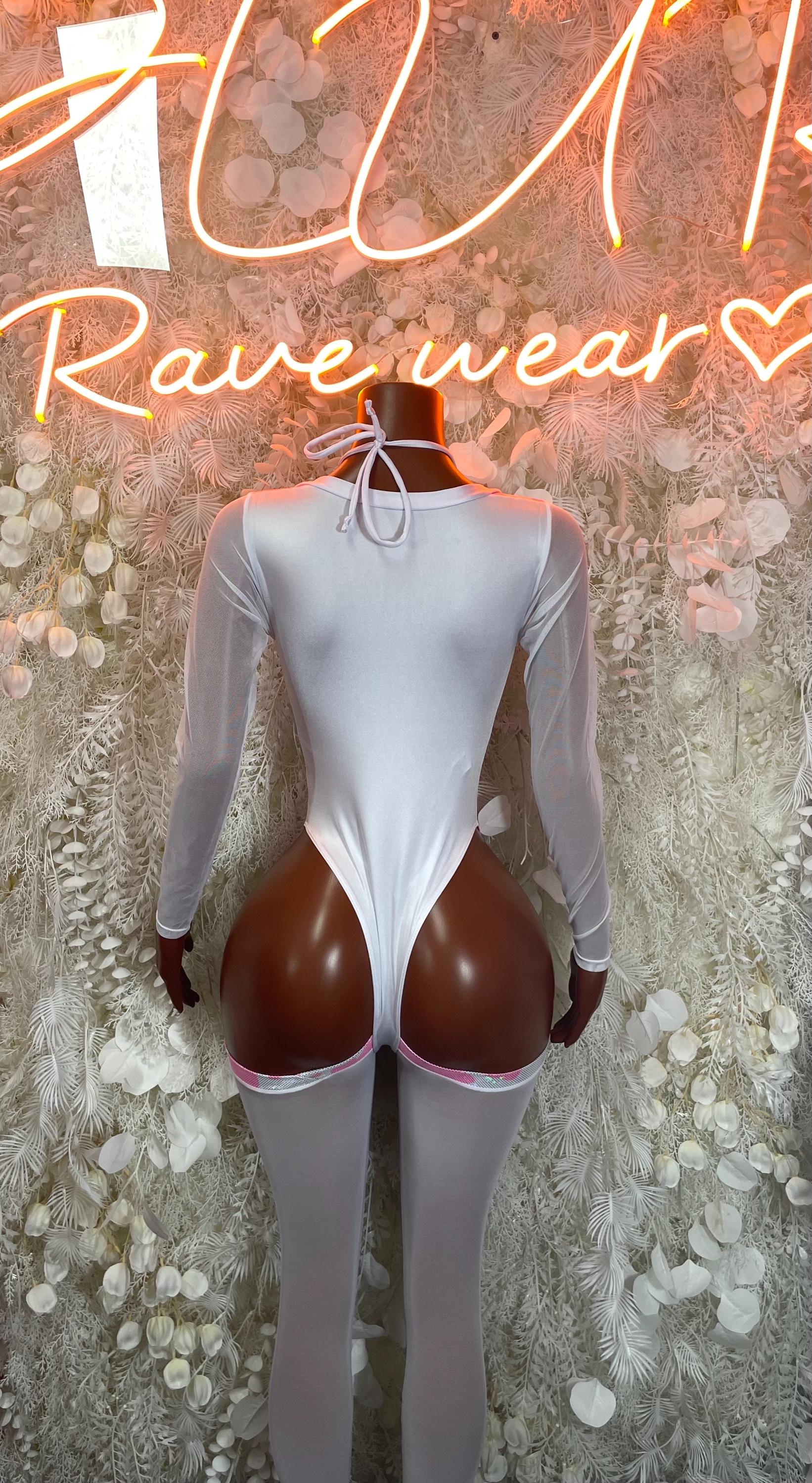 Pink cow print bodysuit with long sleeves and lace-up back detail
