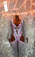 Pink cow print bodysuit with long sleeves and crisscross lace-up front