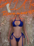 Blue rhinestone triangle bikini set with tie-back straps and matching high-cut bottoms