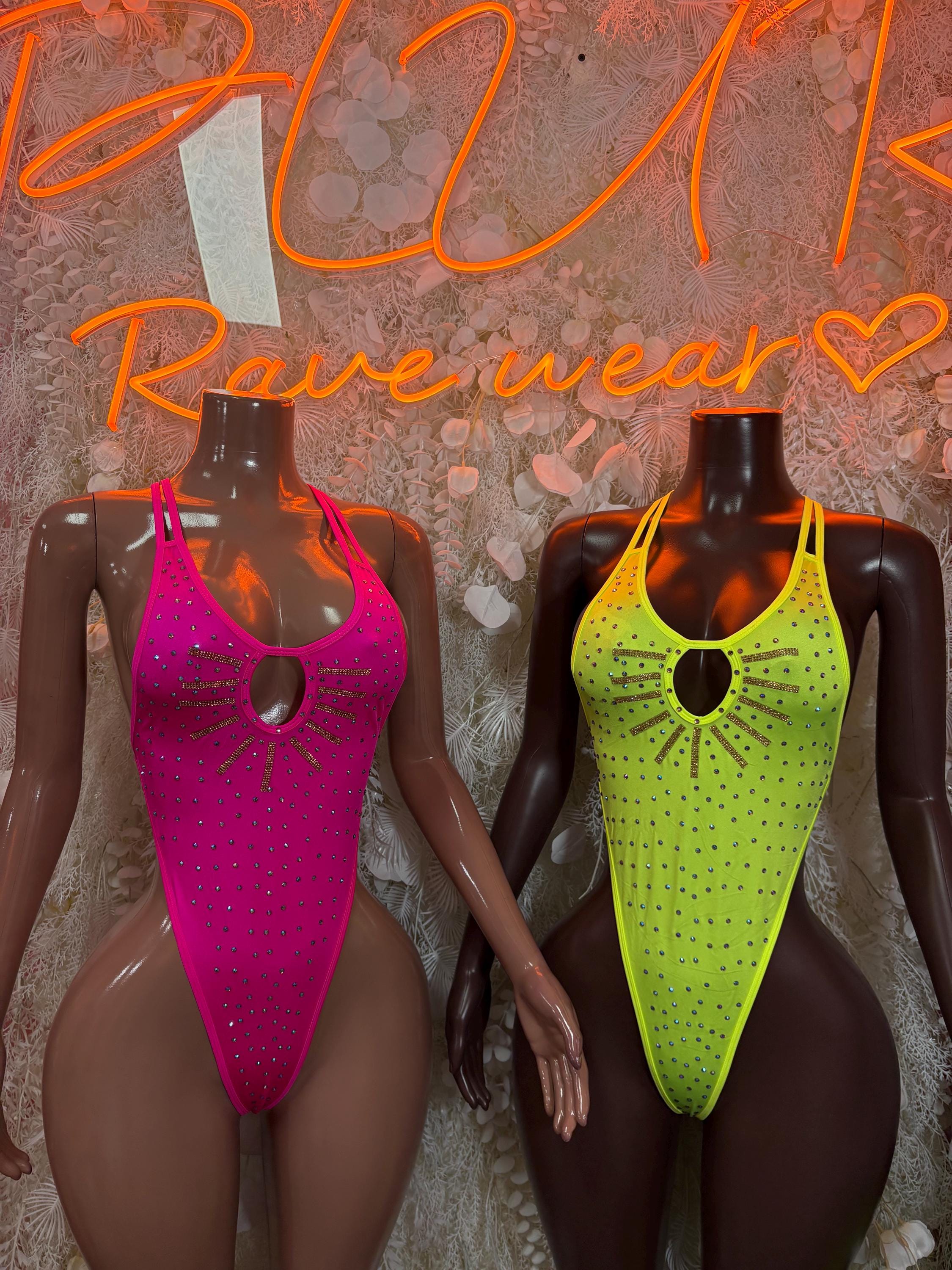 Two rhinestone festival bodysuits: pink and neon yellow, scoop neckline and cutout