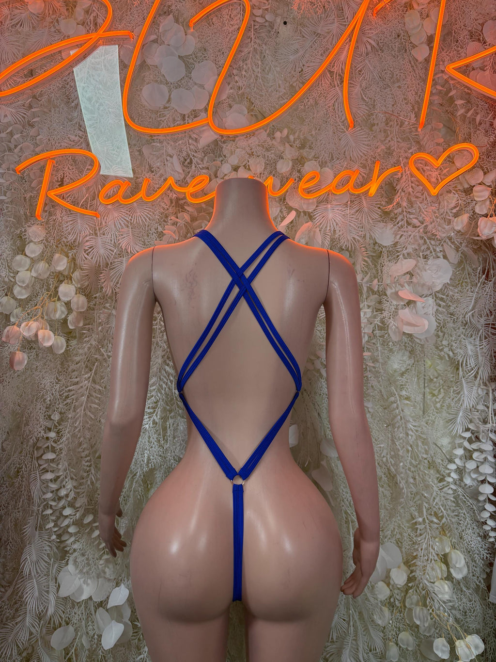 Blue rhinestone bodysuit with crisscross X-back straps and open back