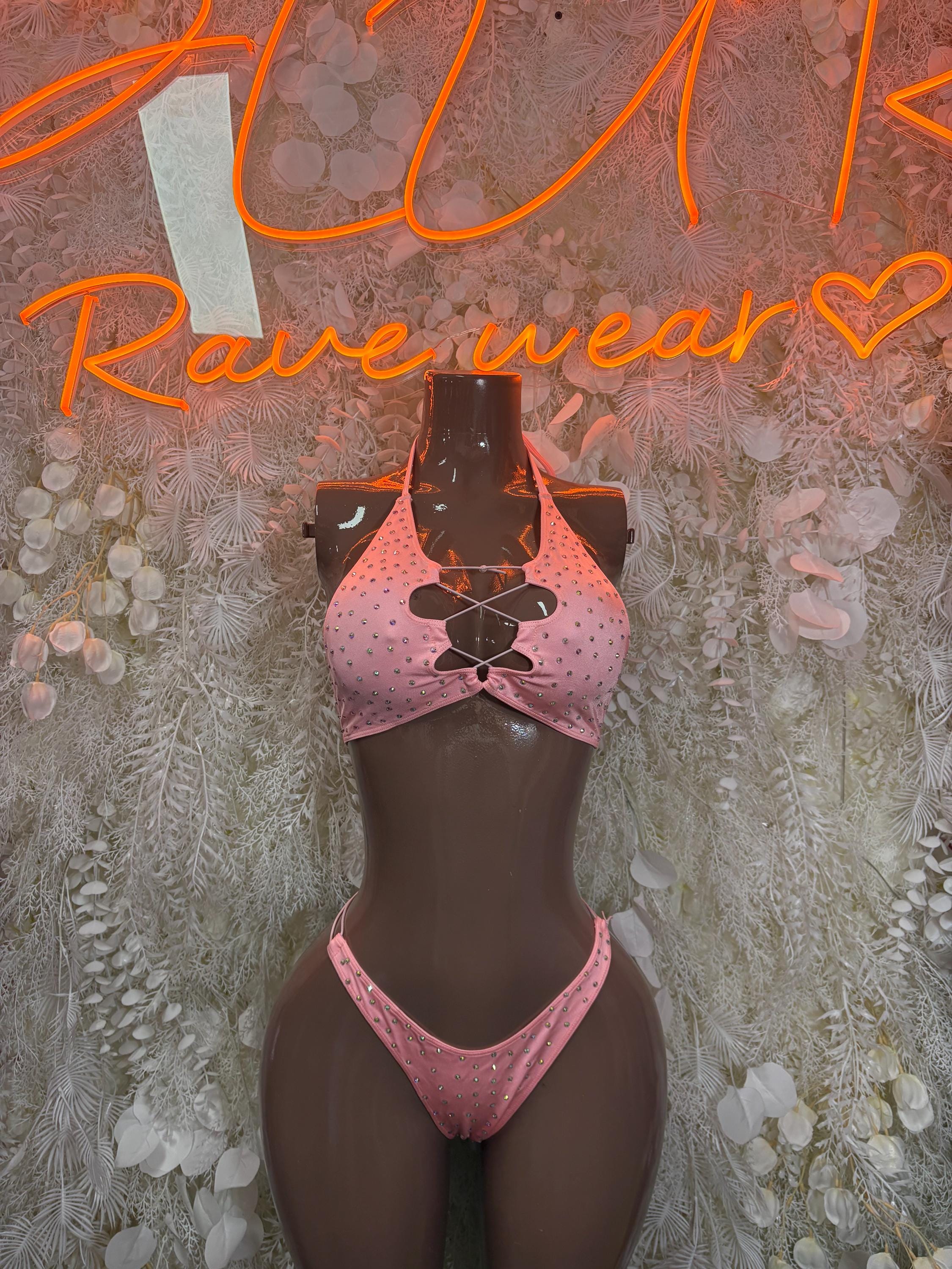 Pink rhinestone bikini set with lace-up cutout at front, matching thong bottoms