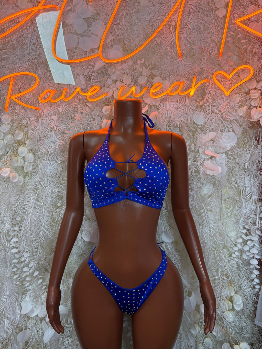 Blue rhinestone halter bikini set with heart cutout and tie strings, front view.