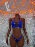 Blue rhinestone halter bikini set with heart cutout and tie strings, front view.
