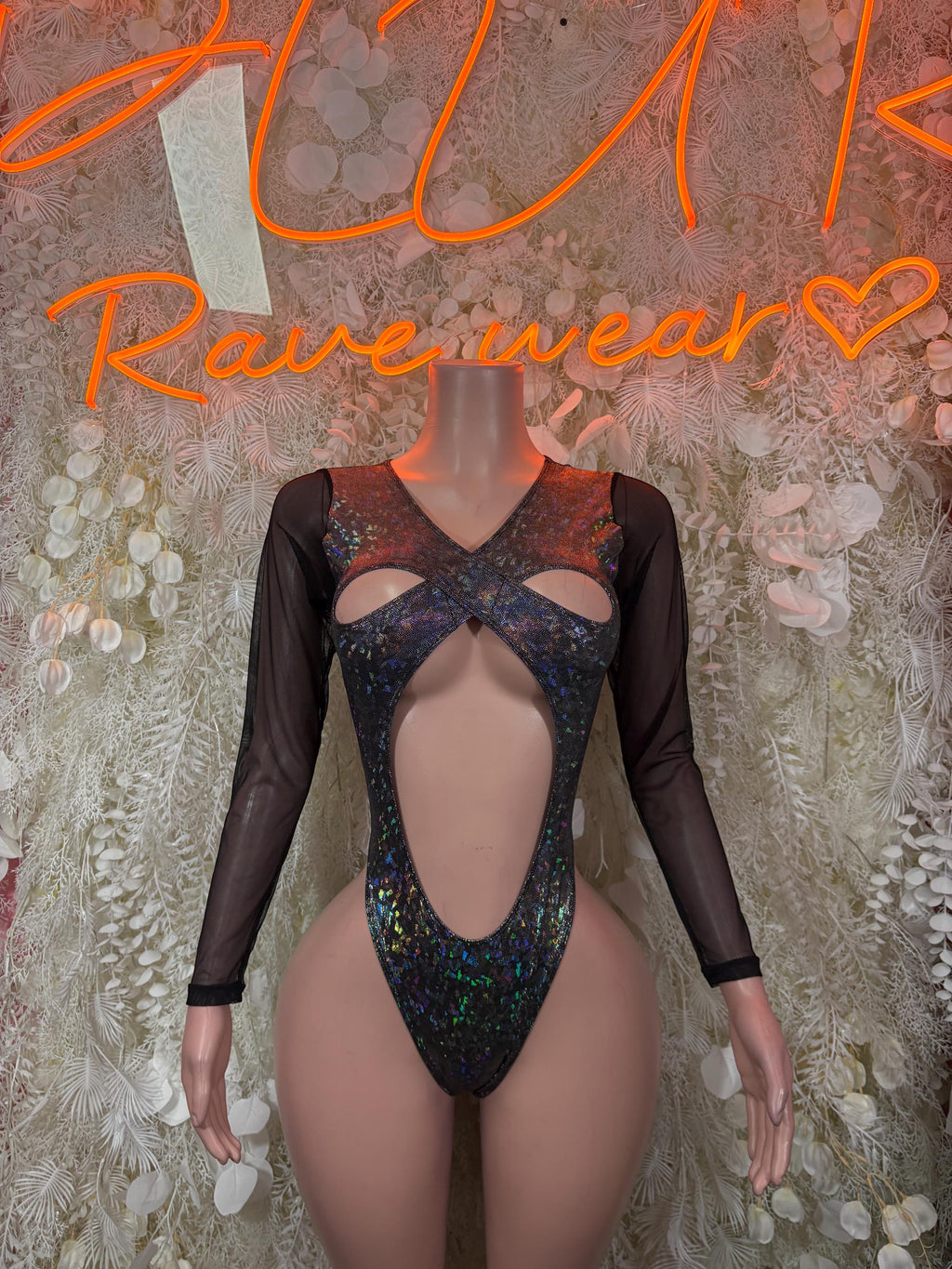 Black metallic bodysuit with long sheer sleeves and deep front cutout V-shape