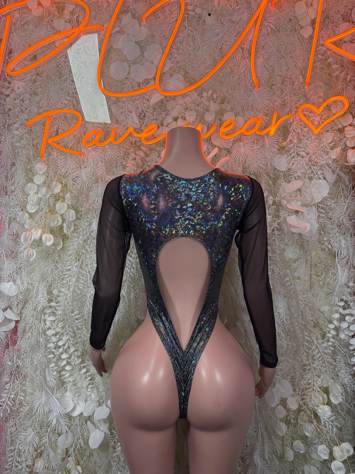 Black metallic bodysuit with long sheer sleeves and back keyhole cutout