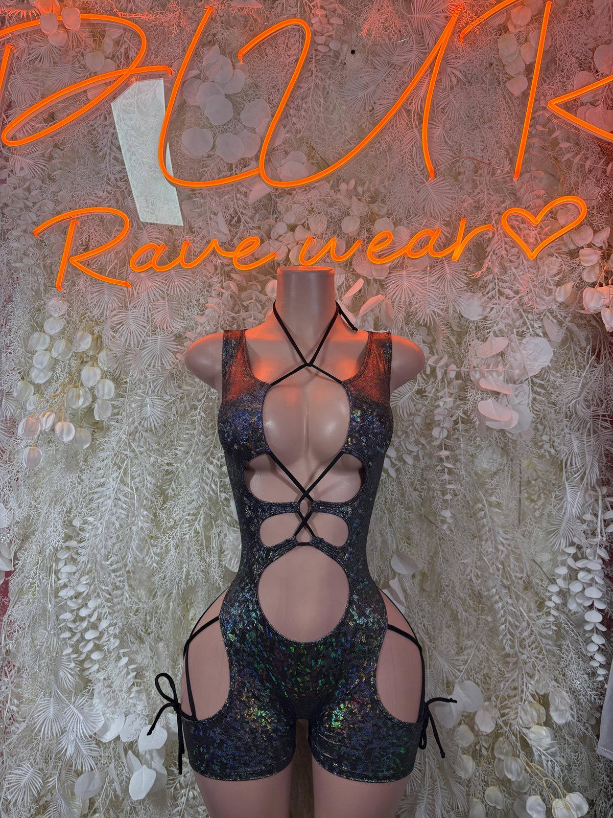 Black metallic cutout bodysuit with halter straps and open chest, one-piece clubwear