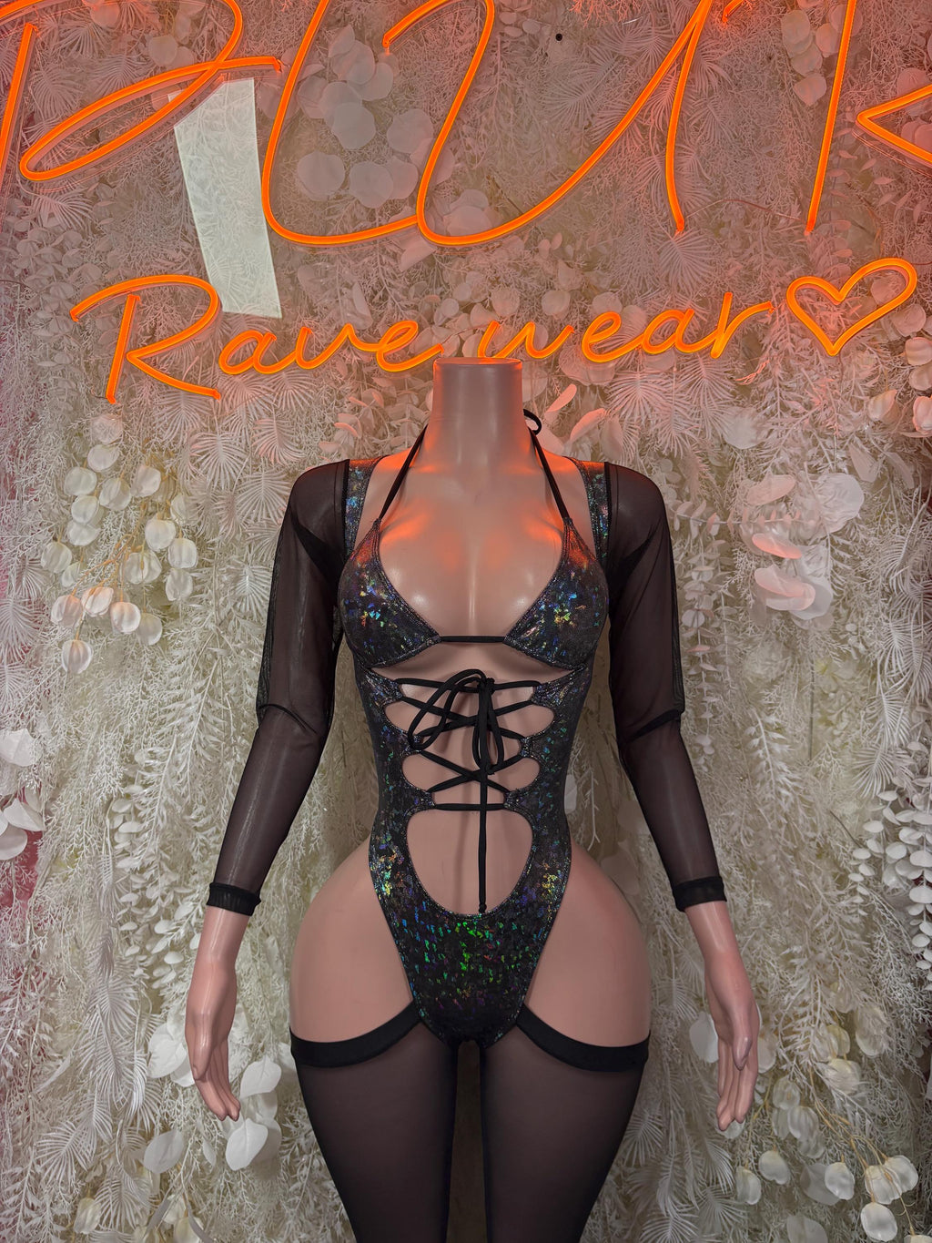 Black sheer-sleeve metallic bodysuit with blue iridescent sequins, lace-up front and cutouts