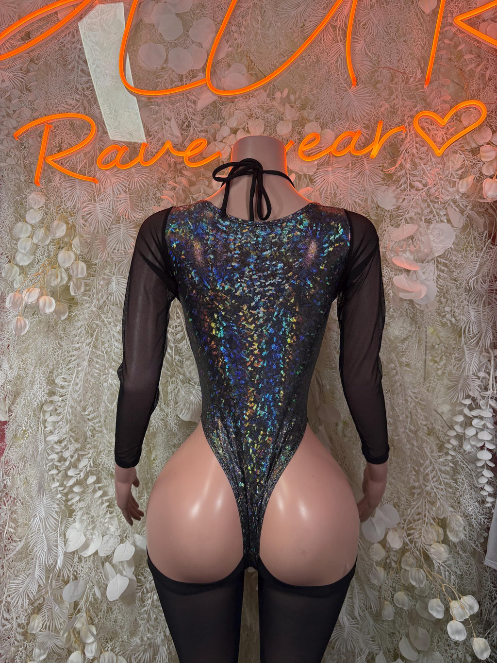 Back-view metallic bodysuit with iridescent blue sparkle, black mesh sleeves and tie collar
