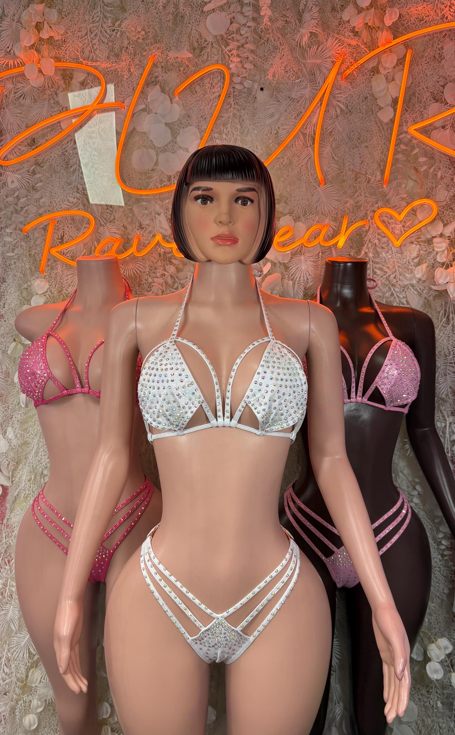Pink rhinestone triangle bikini set on model, multi-strap thong-style bottoms