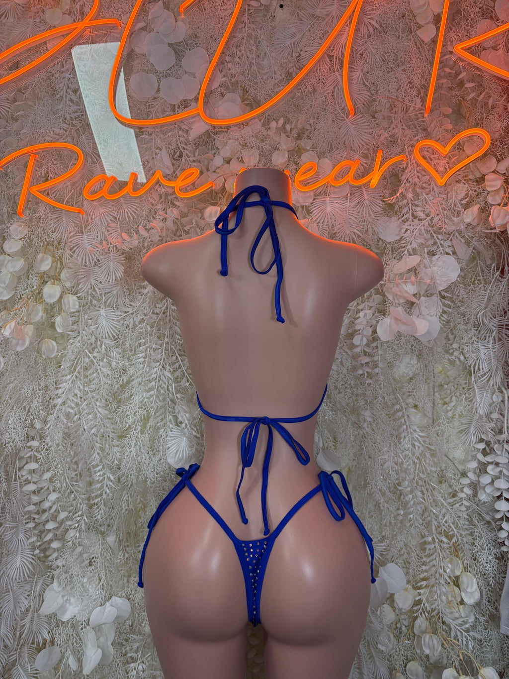 Blue rhinestone bikini set back view with crisscross tie straps and string sides