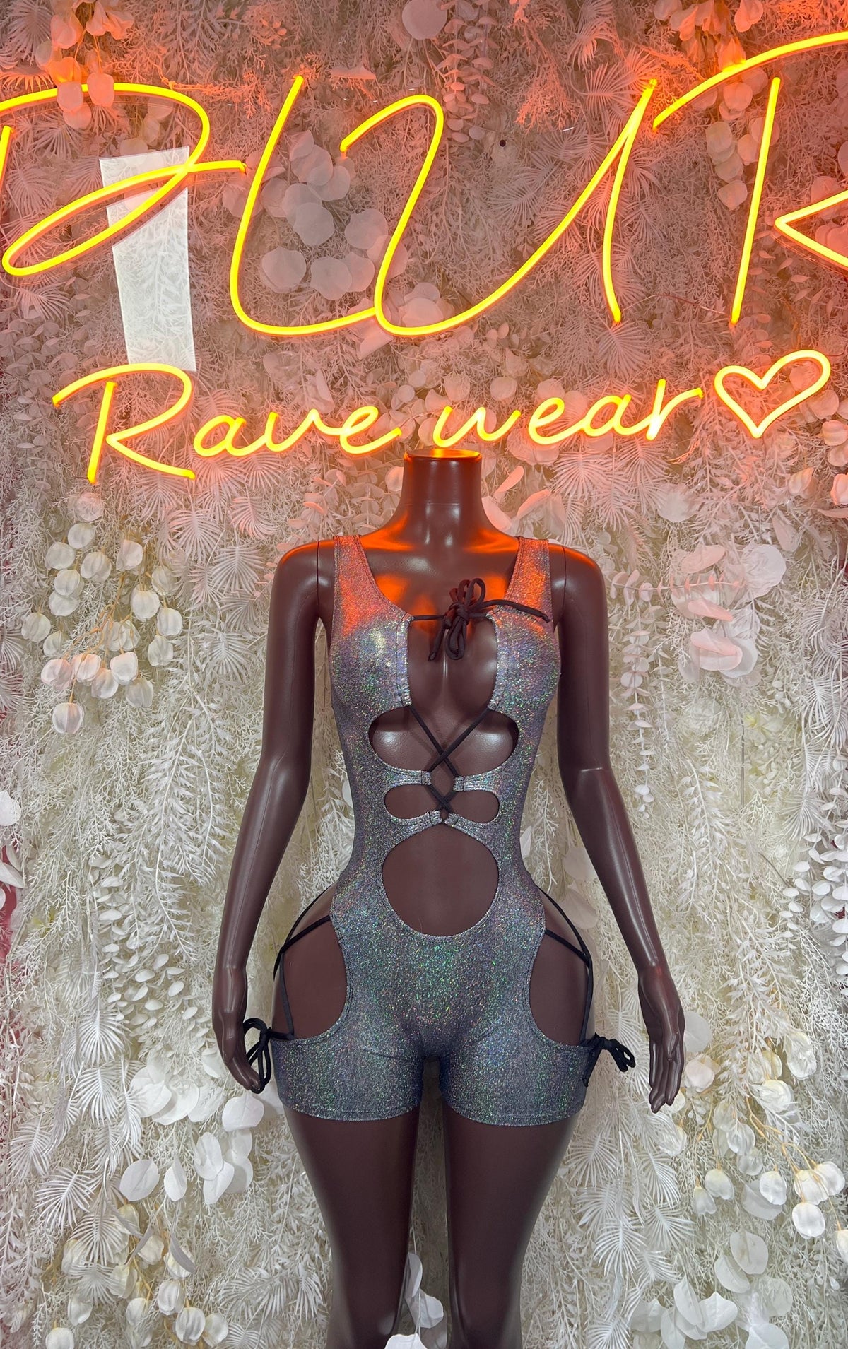 Silver metallic long-sleeve bodysuit with chest cutouts and open back