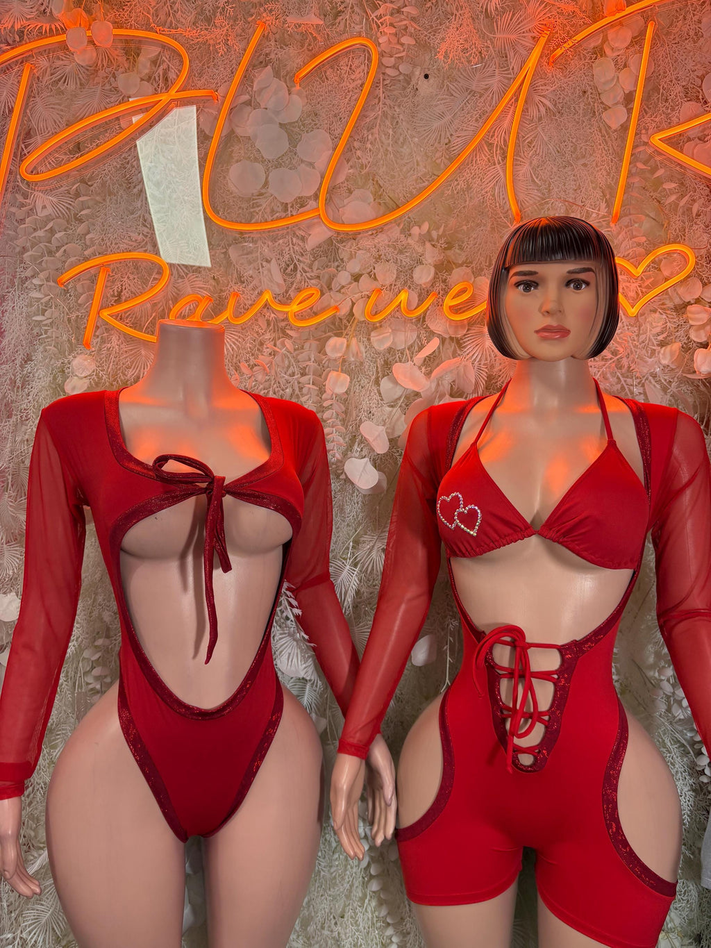 Red long-sleeve bodysuit set with lace-up front bra-style top and high-cut bottoms
