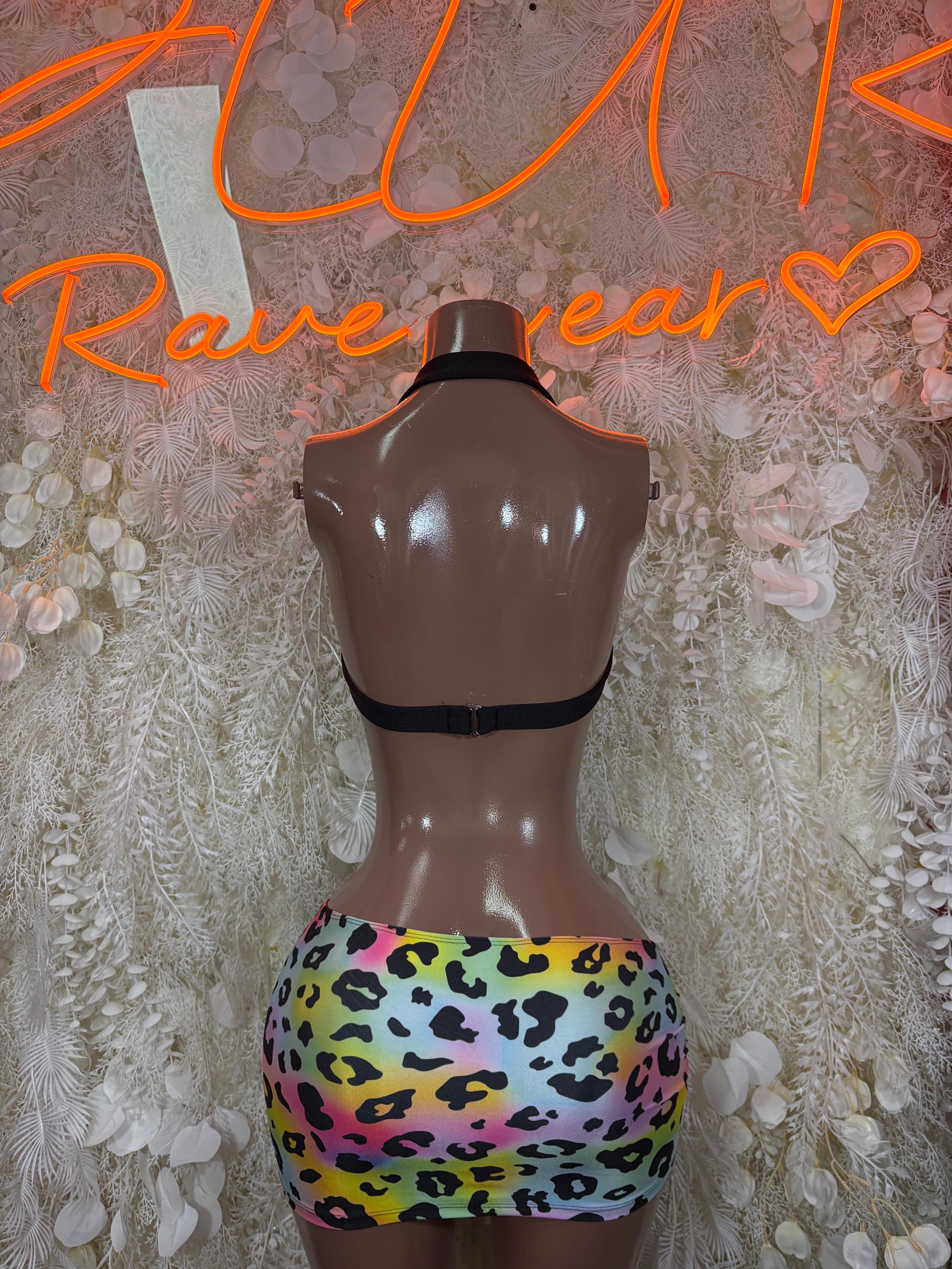 Rainbow leopard print two-piece rave outfit: black halter back and mini skirt