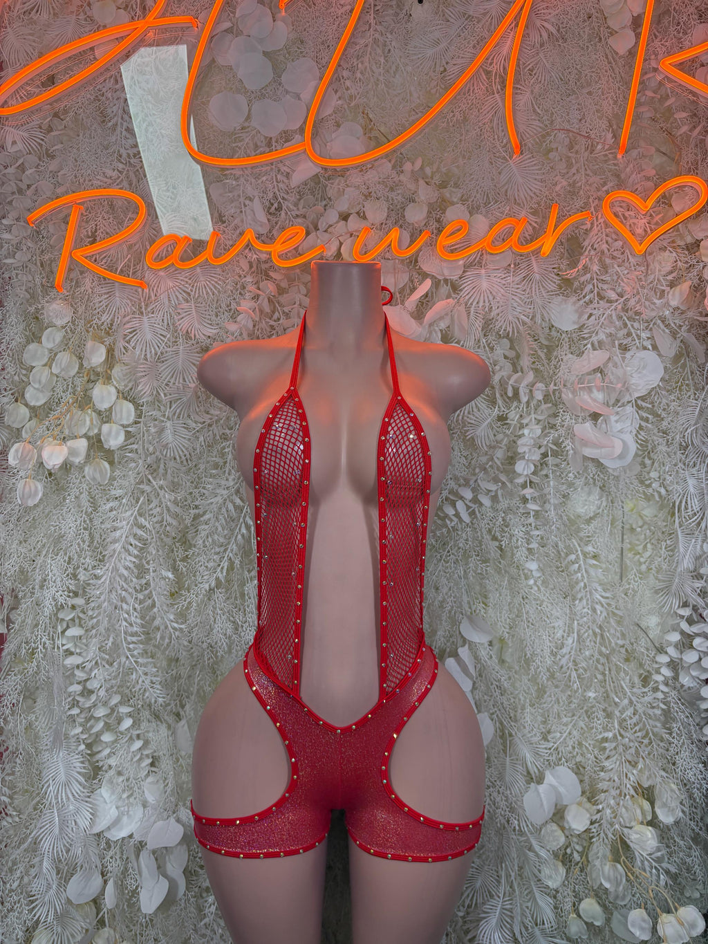Red sequin fishnet bodysuit with halter straps and high-cut side openings