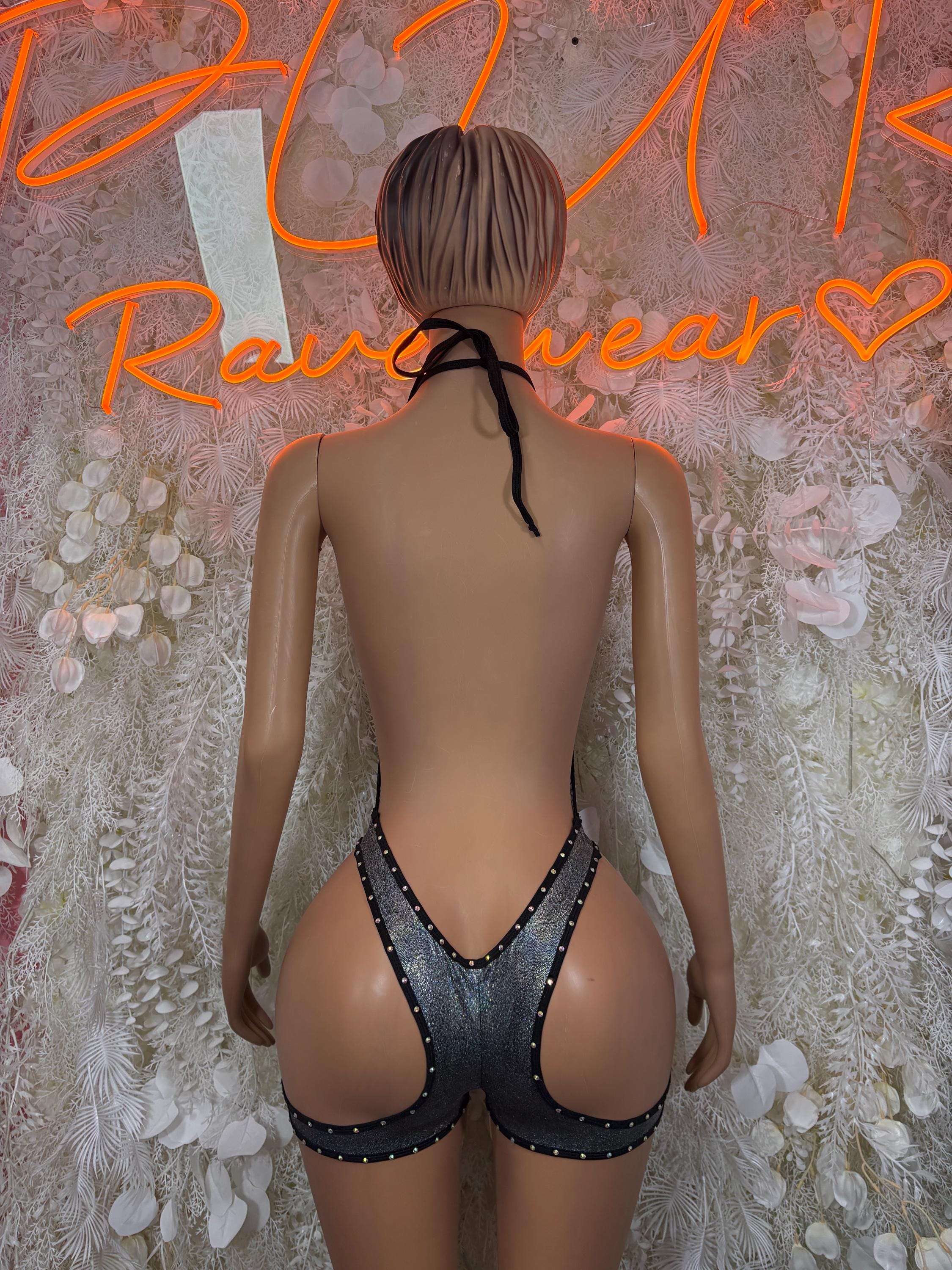 Black fishnet backless bodysuit with halter straps and rhinestone bands