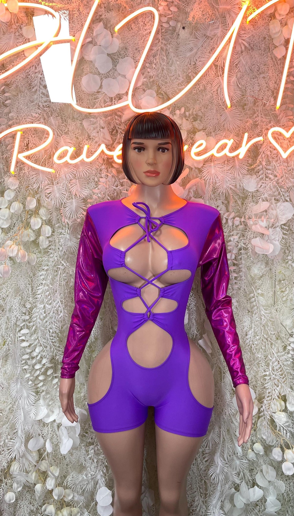 Purple lace-up cutout one-piece bodysuit with long satin sleeves, front view