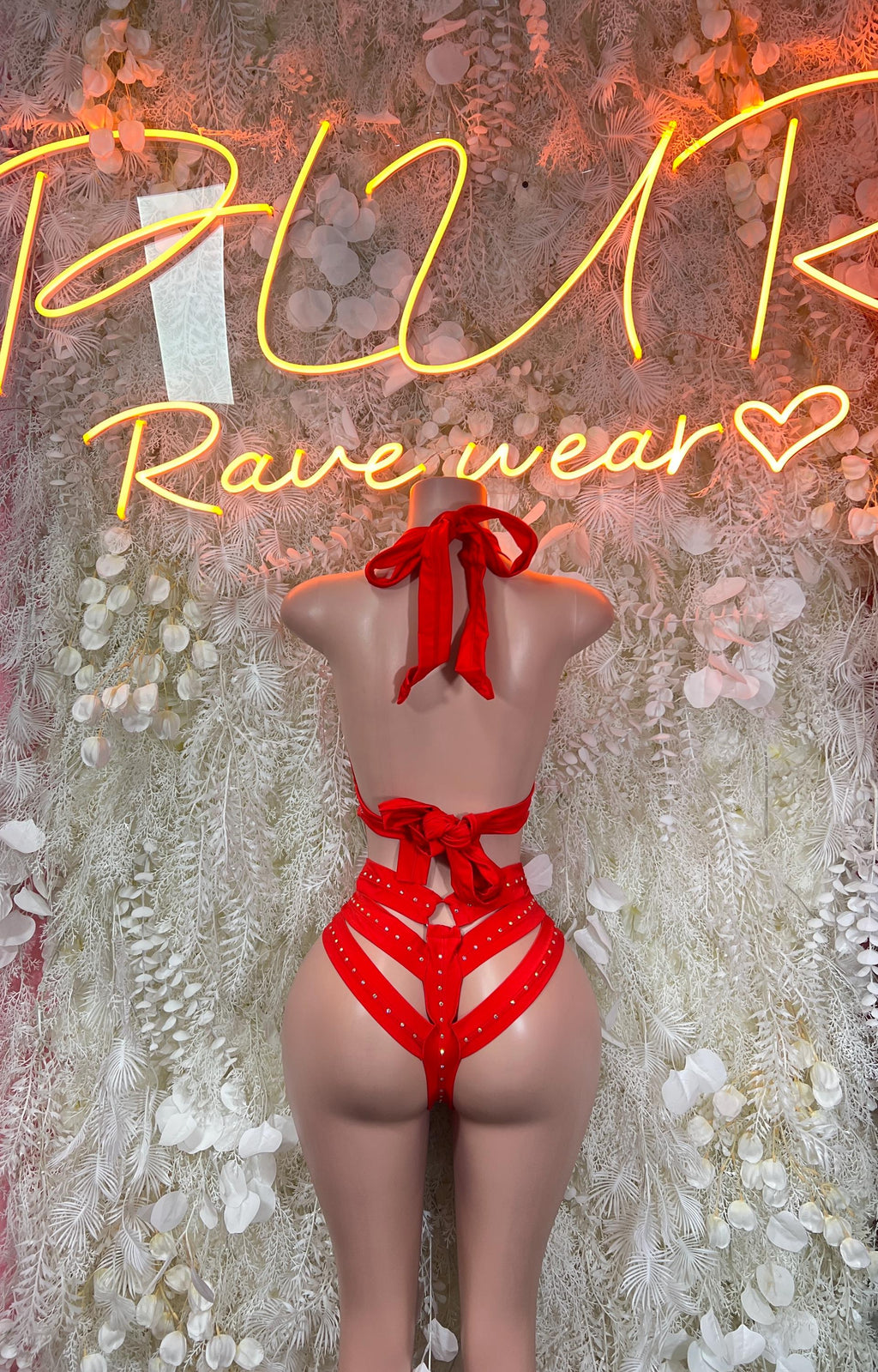 Red rhinestone dance bodysuit with back bow and crisscross straps