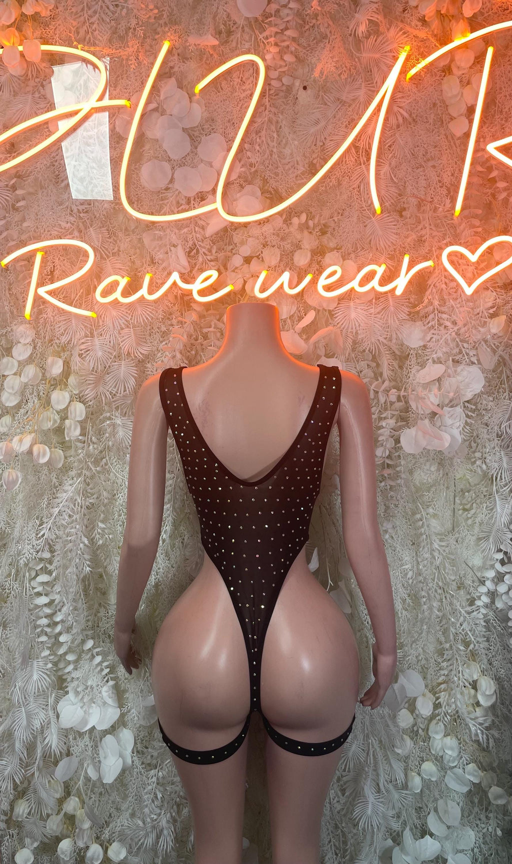 Black rhinestone bodysuit with open V front and studded garter-style thigh straps