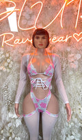 Pink cow print bodysuit, long sleeves, lace-up front, high-leg cutouts