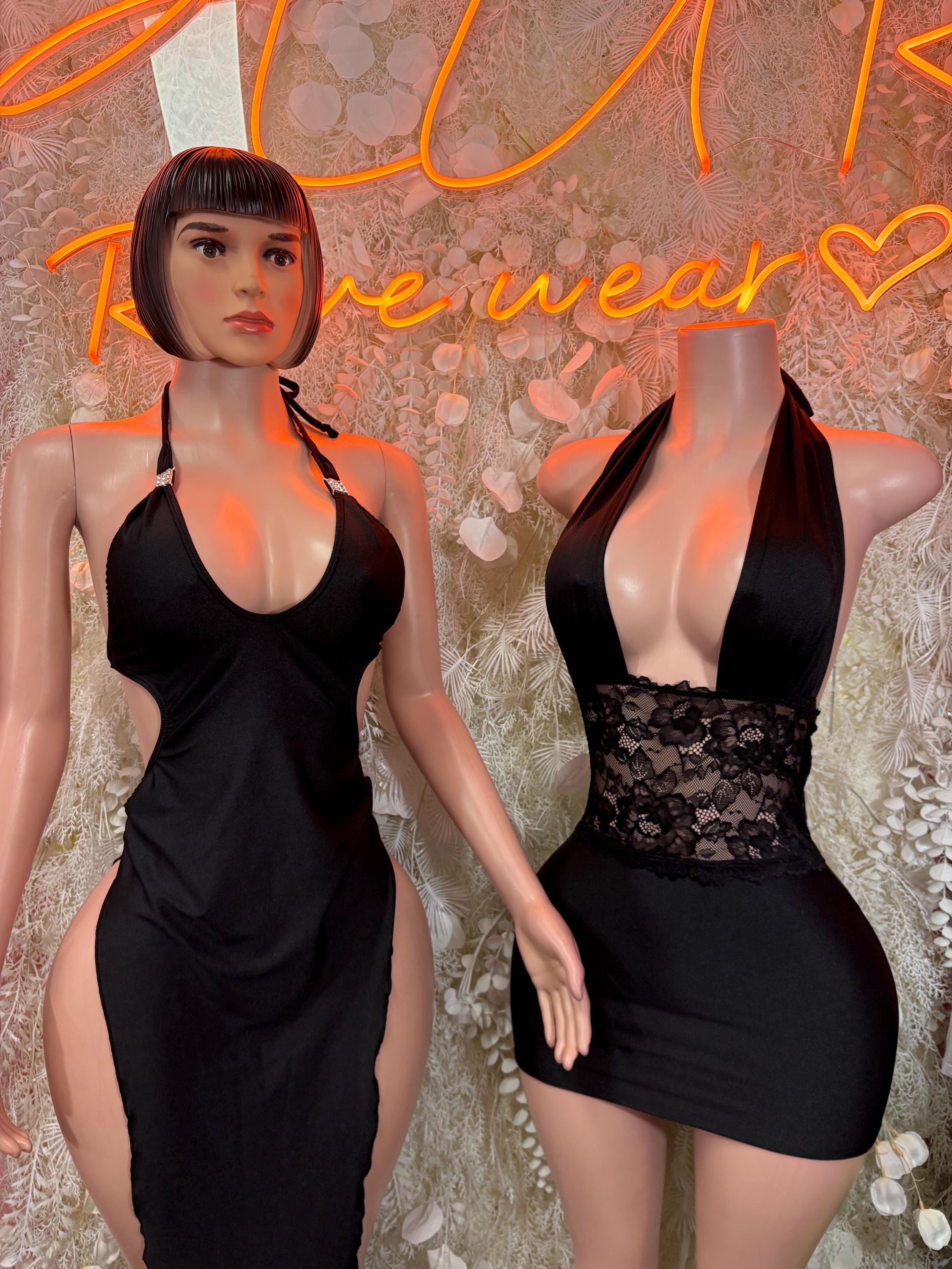 Black halter mini dress with lace panel at chest and low back