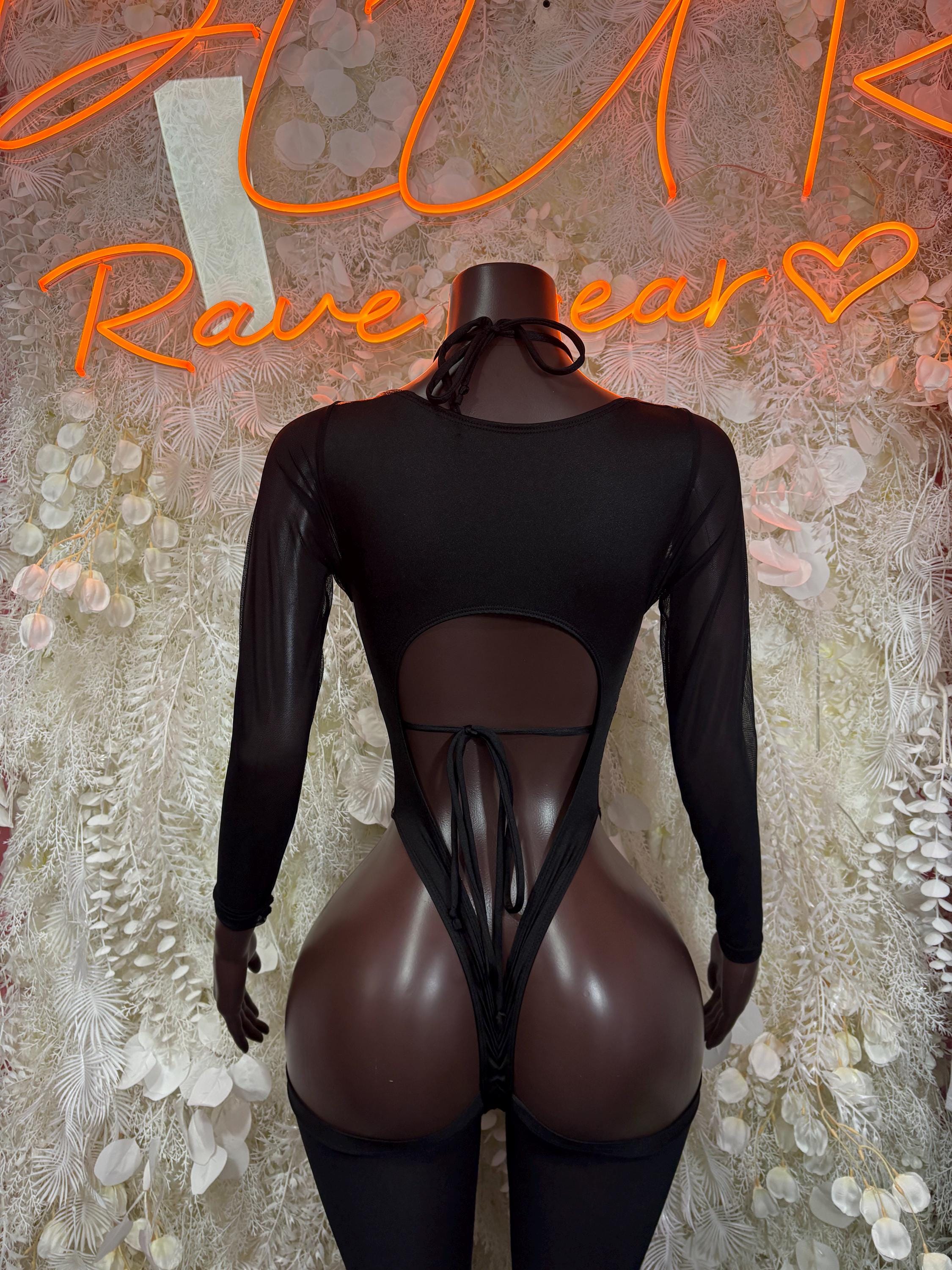 Black sheer-back bodysuit with long sleeves and X-shaped lace strap