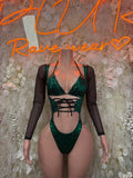 Green cheetah print bodysuit with black mesh sleeves and lace-up front cutout