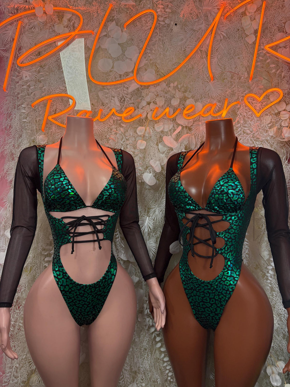 Green cheetah print bodysuit with black mesh sleeves, lace-up front and back