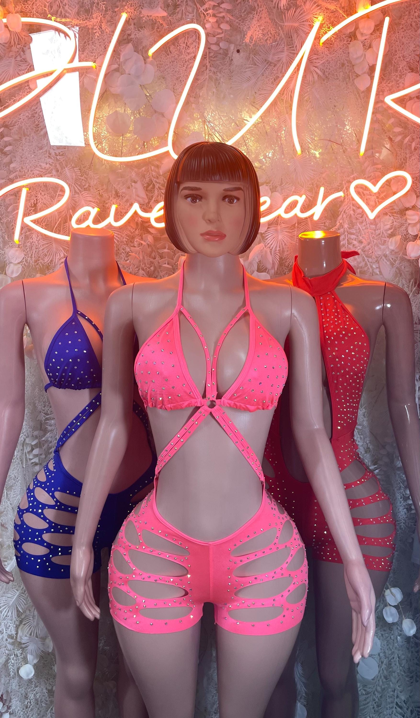 Pink rhinestone halter one-piece bodysuit with cutout front and tie neck, dancewear