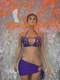 Purple two-piece skirt set with glitter bra top and tied mini skirt, front view